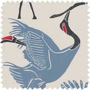 A swatch of the Novogratz Family of Cranes in Waverly Blue shows the intricate avian design