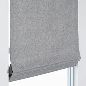 A product image of a Flat Roman Shade shows the crisp, clean folds of fabric and flat face of this modern shade