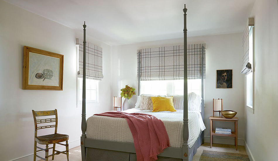 Bedroom window treatment ideas for a cozy farmhouse style include Flat Roman Shades made of Aberdeen in Oat