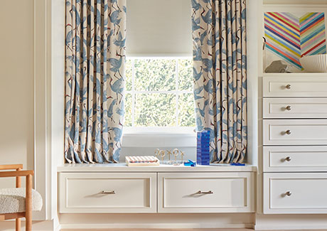 A kids room has a built-in window seat with window seat ideas like Ripple Fold Drapery in Family of Cranes, Waverly Blue