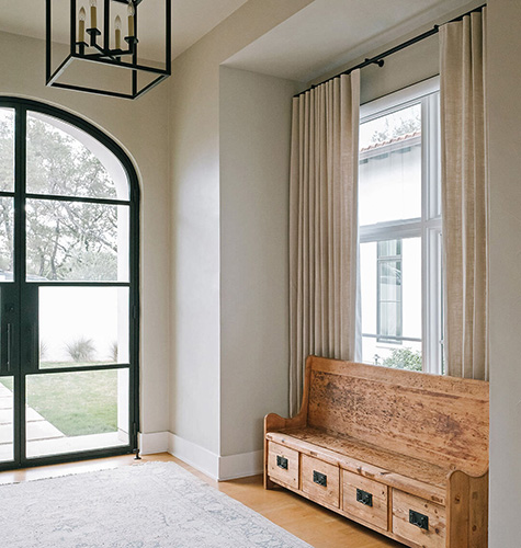 Ripple Fold Drapery made of Luxe Linen in Beige is one of the window seat ideas used in an entry with a wood bench