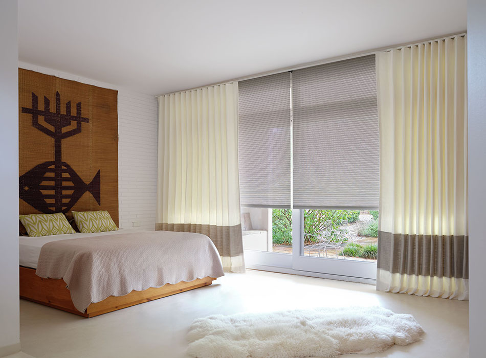 Sliding glass door curtain ideas include Ripple Fold Drapery made of Luxe Linen in Oyster and Flax for a boho chic bedroom