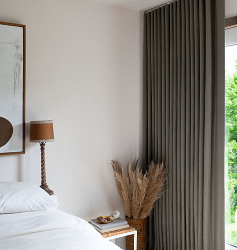 Bedroom window treatment ideas should be functional and suit your look, like Ripple Fold Drapery in Lisbon Woven, Agave