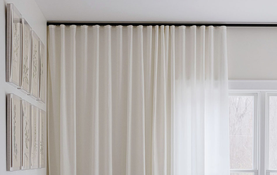 Dining room curtain ideas like Vitela fabric in White on a Madison track system make for easy use