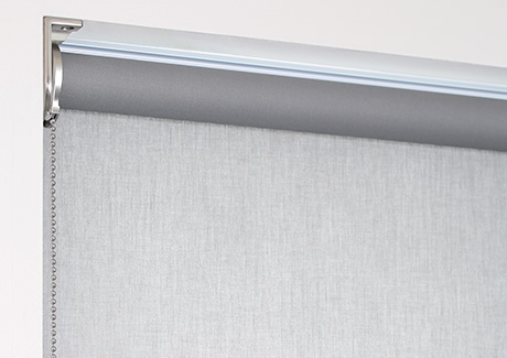 A product image of Roller Shades for windows shows a regular roll where the material falls off the back of the tube