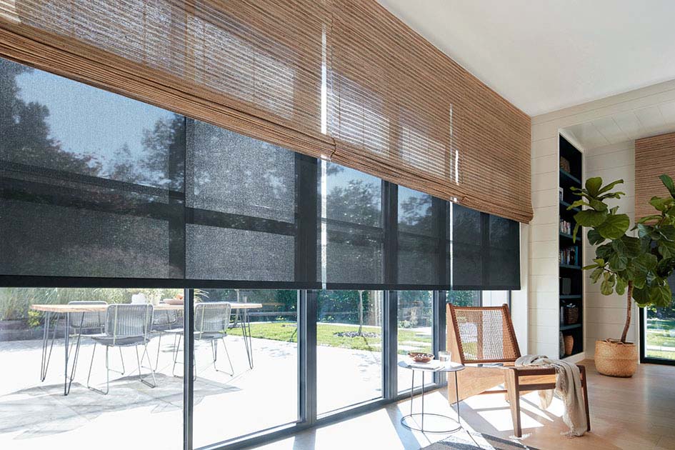 https://www.theshadestore.com/blog/wp-content/uploads/the-shade-store-solar-shades-5-percent-black-woven-wood-shade-cove-beige-mid-century-modern-window-treatments-hero-2021-madison-945x630px.jpg