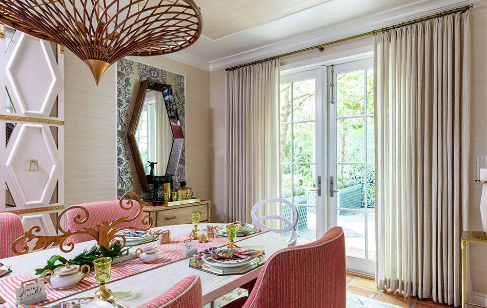 Dining room curtain ideas like light sheer drapes soften the bold pink upholstered accent chairs