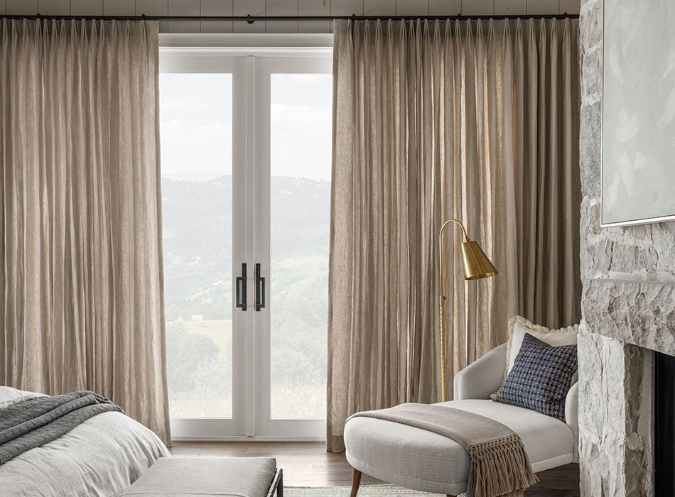 Sliding glass door curtain ideas include Tailored Pleat Drapery made of Linen in Natural in a bedroom with a view