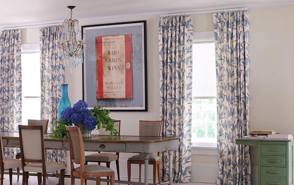 Dining room curtain ideas with patterns like Family of Cranes in Waverly Blue add movement to your design