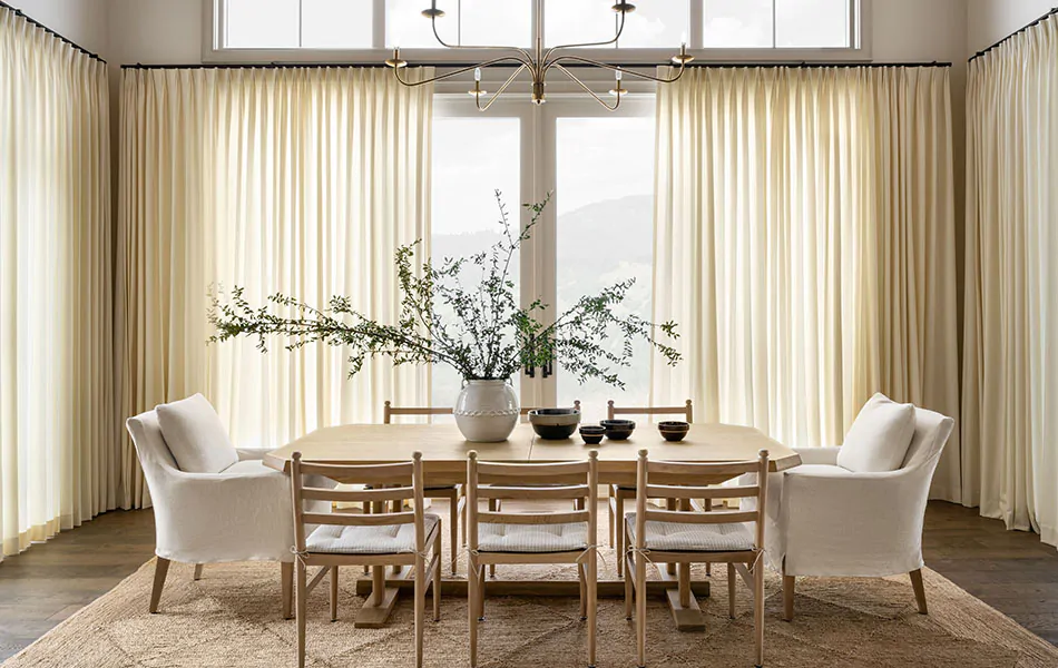 Dining room curtain ideas like soft Wool Blend drapes in Snow from wall to wall create an inviting space