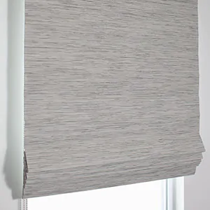 A product image of a Waterfall Woven Wood Shade shows the crisp flat folds and natural woven texture