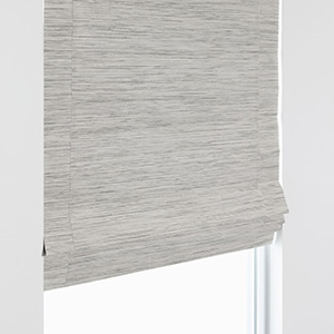 A product image of a Waterfall Woven Wood Shade shows the crisp, flat folds of woven fabric for a modern look