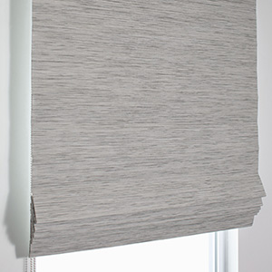 A product image of a Waterfall Woven Wood Shade shows the crisp folds of fabric and textured material